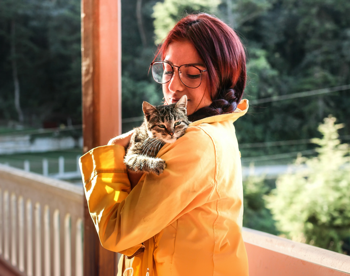 Happy pet parent with their pet